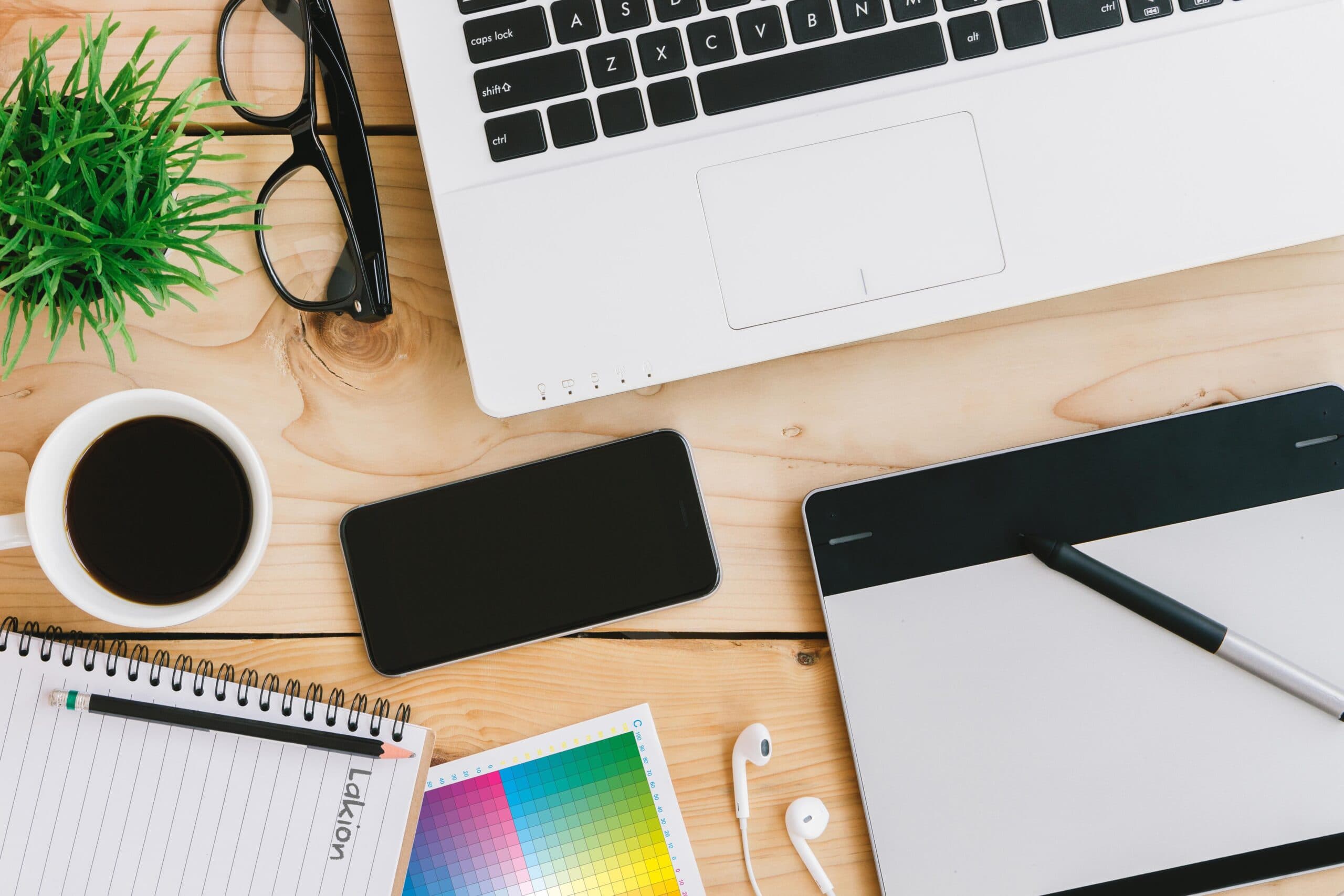 Workspace with laptop and tablet